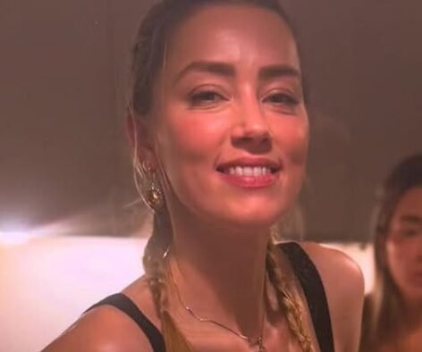 Amber Heard reveals rare look into her life with family photos after changing her name and moving to new country